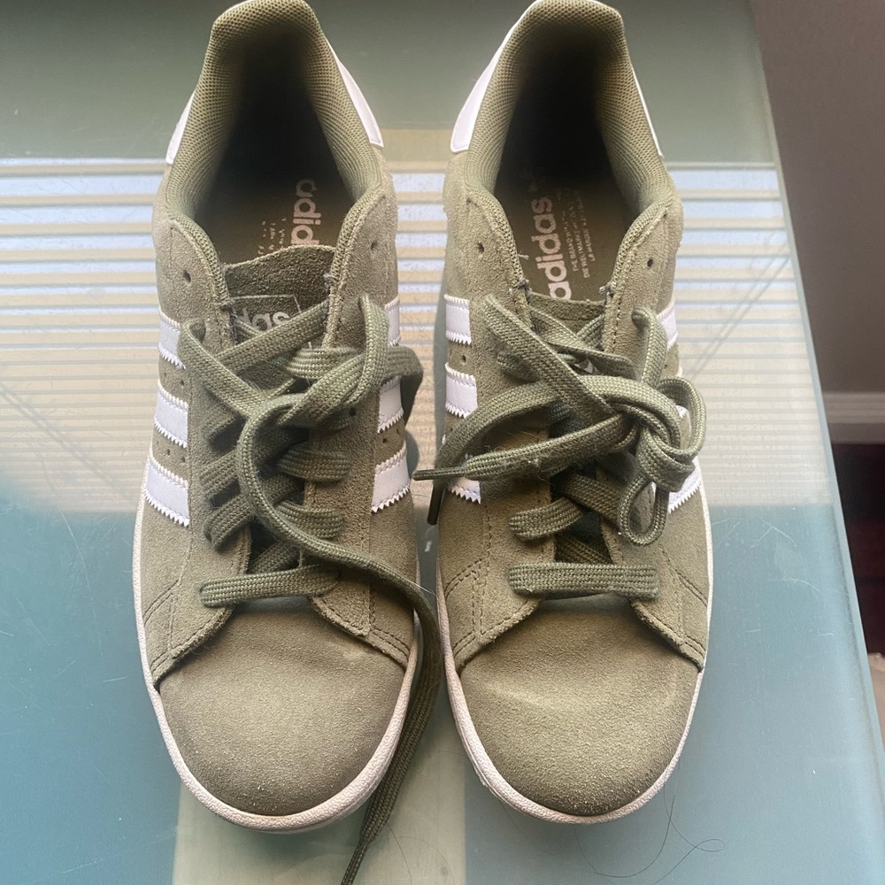Green adidas sneakers